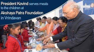 President Kovind serves meals to children at the Akshaya Patra Foundation in Vrindavan.