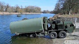 Strength and Precision: US Soldiers Build a Bridge on Germany's Danube River