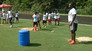 Detroit Lions’ DJ Reader hosts free football camp in Greensboro