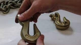 What makes a compliant grab hook different from a non-compliant grab hook?