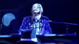 Jeff Burkett as Elton John, aka Candle In The Wind, The Elton John Experience 1
