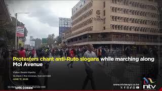 Protesters chant anti-Ruto slogans while marching along Moi Avenue