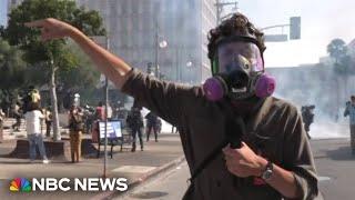 Police deploy tear gas at L.A. protest near federal building