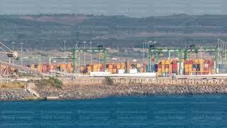 Aerial view of container cargo terminal of commercial port timelapse, business logistics and