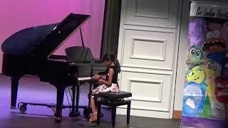 02 Rivini Siriwardana - Playing Piano