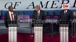 GOP DEBATE:TRUMP HIGH-FIVES CARSON FOR IRAQ WAR IDEA