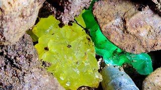 At the highest point of the cliff. A two-color diamond is hidden in the cracks of the rock.