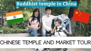 Indian-Chinese family going to a Chinese temple