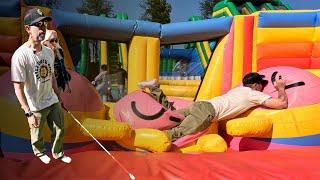 Blind Guy FACEPLANTS at world's biggest bouncy house!