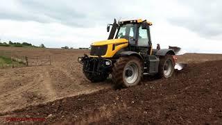 Ploughing with JCB Fastrak 2155 and Four Furrow.