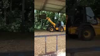 Scott in the JCB loading the trailer