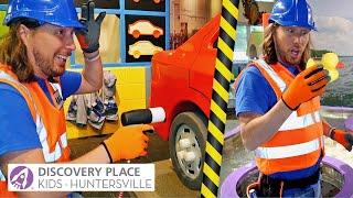 Handyman Hal explores Discovery Place Kids | Fire Trucks, Race Cars, and Fun for Toddlers