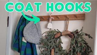 How to fit coat hooks to a solid wall