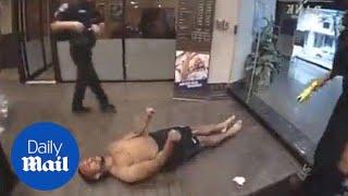 Disturbing footage of man fatally tased after breaking into bank