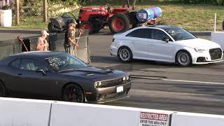 Drag race.  Supercars vs Muscle cars.