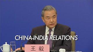 China's FM says China-India relations have made positive stride in the past year