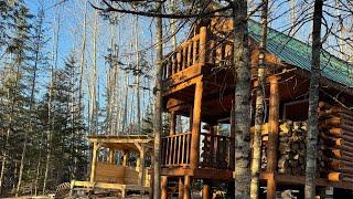 Log Cabin Build in the North, Railing finish under the second floor of the balcony,￼Surviving winter