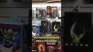 NECA Horror action figure wall, so many of them