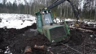 John Deere 1110D stuck deep in mud (in wet peat)