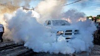 4X4 BURNOUT - 15,000lbs Dumpster vs 8000lbs Dodge Ram Pickup