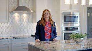 Dione Irwin Tours this gorgeous fully developed bungalow, with walkout, backing on to a greenspace