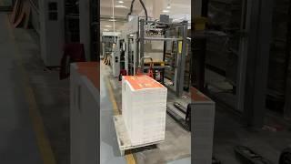 Laminating face paper and corrugated paper together to form the outline of a box #paperboard #paper