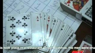 Over zealous police officers arrest people playing cards for fun.