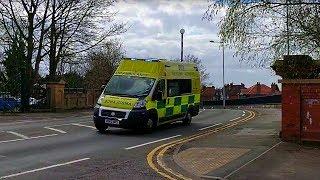 Ambulance with Unusual Lights and Siren Responding