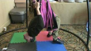 Paraplegic Stretches Spine for Decompression & Inversion Therapy on Omni-Swing