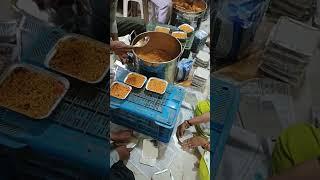 Anna Seva packing of food.