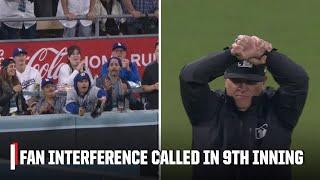 Fan interference ruled as Dodgers fan reaches over the wall for Gleyber Torres hit | ESPN MLB