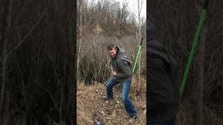 Shooting arrow into swamp brush. Bowfishing line snaps, then Arrow Out comes to the rescue.