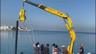 Puma work boat hydraulic crane,pipe hammering machine