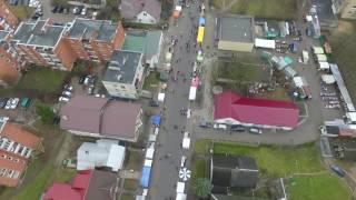 Flight Over Small Town, Fair On Street 1 - cutestockfootage.com