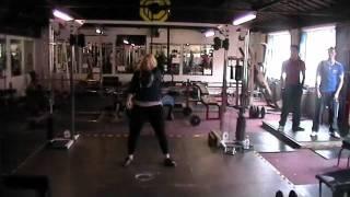 Girl Snatches a 24kg Kettlebell For Reps (Centaur)