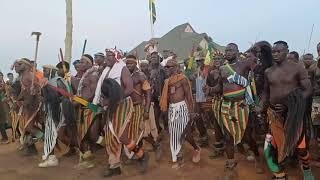 At the Palace of the Paramount Chief of the Talensi area as Golob dancers descent to pay homage.