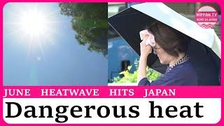Japan swelters in record June heat