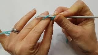 How to hold the crochet hook and yarn