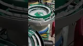 máy rung cấp phôi lựa đầu bút màu / phễu rung/ part feeder/ vibratory bowl feeder phone: 0901295213