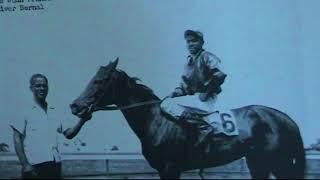 Eddie Arcaro blocks negro jockey at Aqueduct ice track