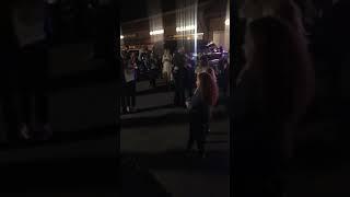 Dancing for the Borderline Victims in a parking lot