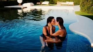 Deep kiss between lesbians in the pool