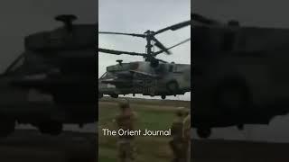 Russian Ka-52 attack helicopter flies low near Russian troops | Ukraine war footage