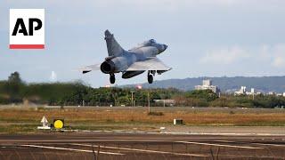 Military jets take off from Taiwan air base after Chinese forces seen near island