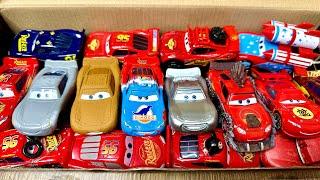 Full box of Disney Pixar Cars: Lightning McQueen, Miss Fritter, Doc Hudson, Sally, Cruz Ramirez, Flo