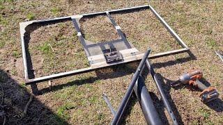 Off grid homemade solar array stand made from an old basketball goal!