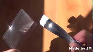 Credit card size Fresnel lens fire starter test