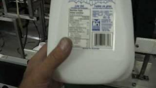 LABELMATIXX AC-310 MILK JUGS LABELLER.wmv