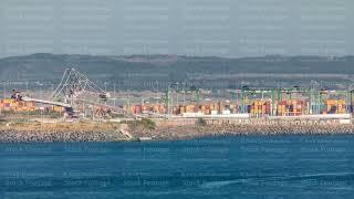 Aerial view of container cargo terminal of commercial port timelapse, business logistics and