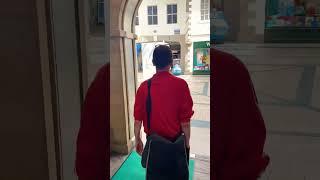 Tilly Up North never forgets his radio. Shopping in Kendal